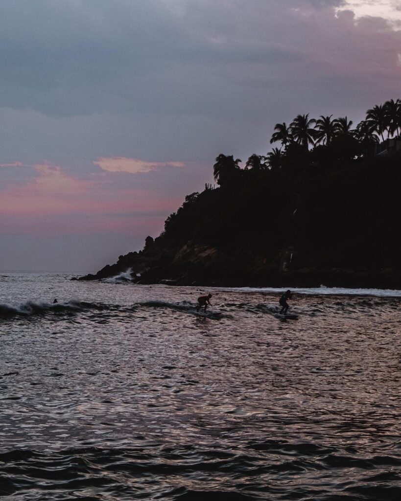 Playa Carrizalillo surfing at sunset