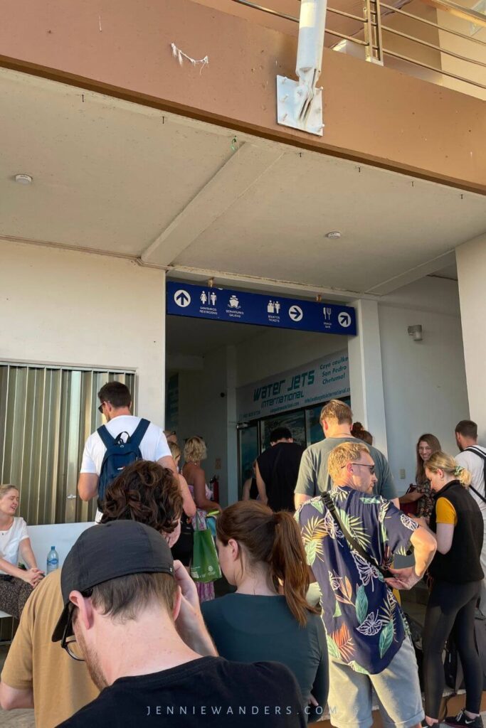 People waiting in line for the Chetumal ticket office to open