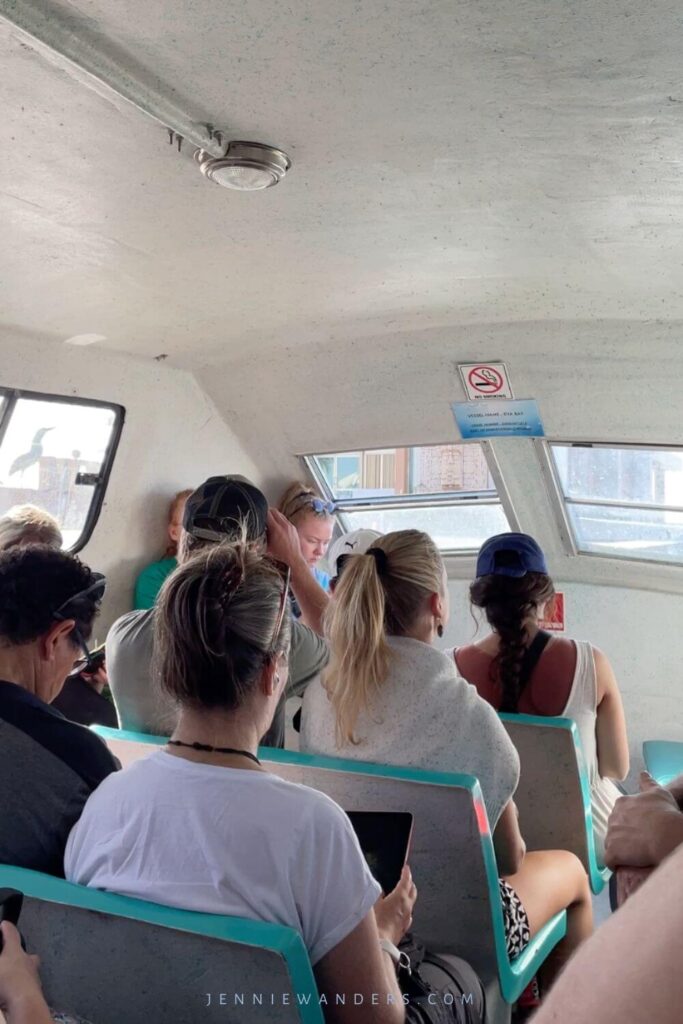 People sitting on the boat looking out of the front window