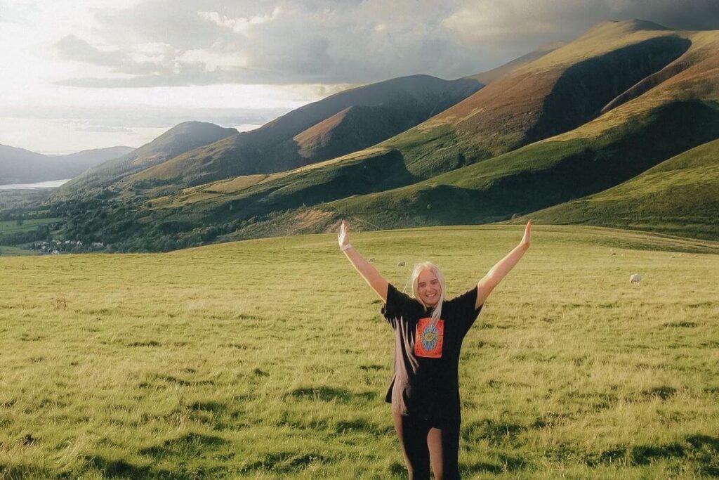 I have my hands up celebrating reaching the Latrigg viewpoint