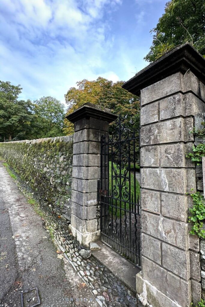 The dark gate that you can enter to reach the Rydal waterfall