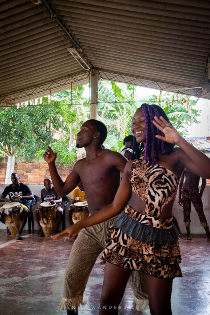 people dancing in colombia wearing leopard print clothes