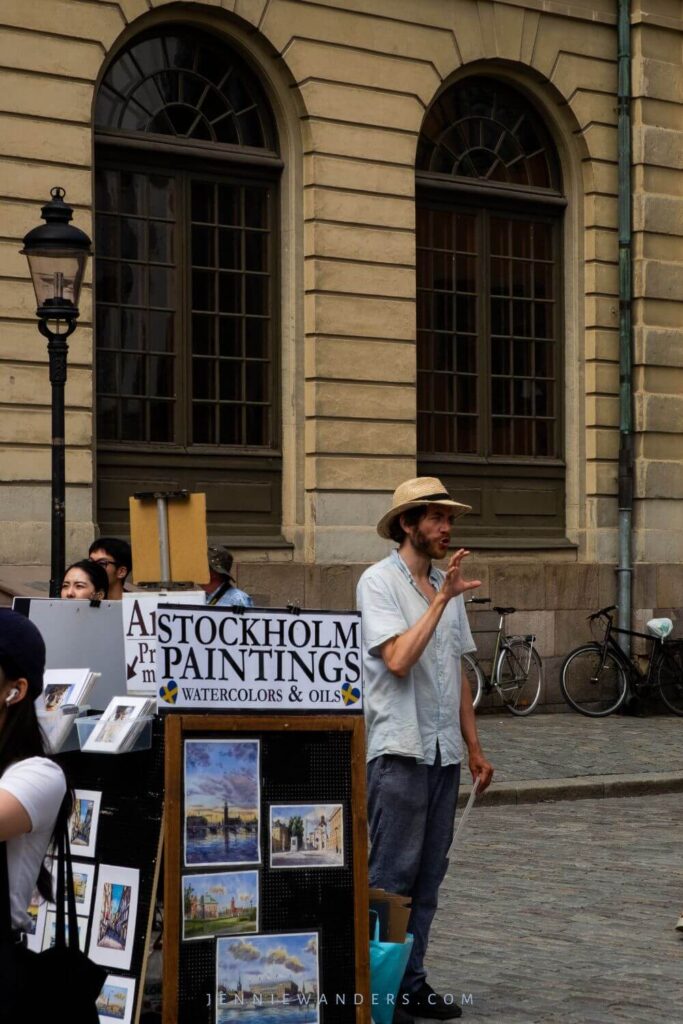 man selling street art