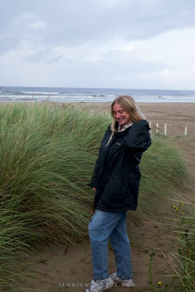 Me on a beach looking down to the floor