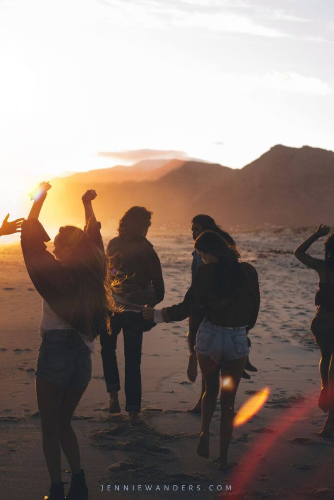 People dancing on the beach